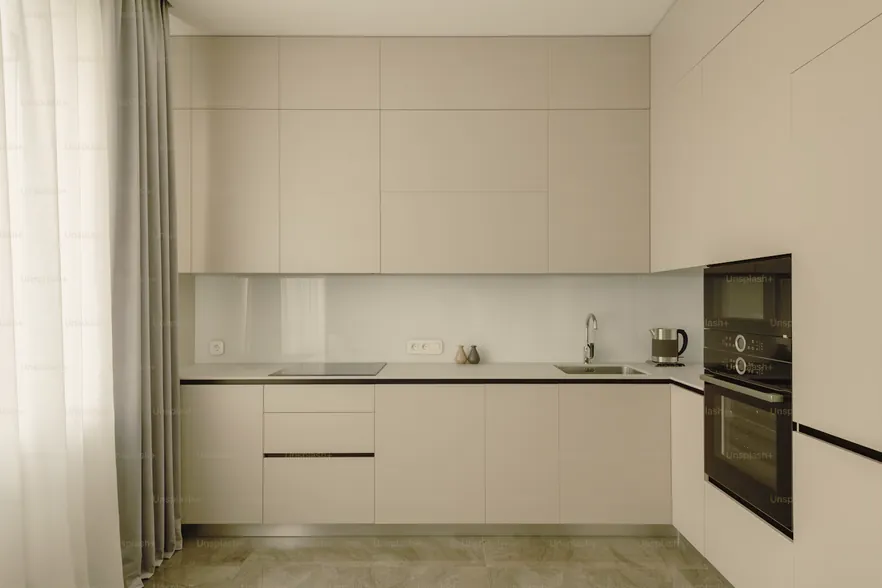 Minimal white handleless kitchen